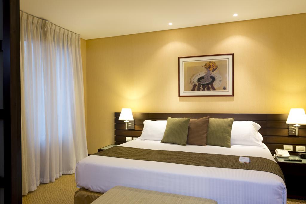 Отель Eurobuilding Express Майкетия Экстерьер фото A bedroom at the hotel
